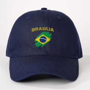 Detail view of navy blue cotton baseball cap featuring yellow BRASILIA text and flag