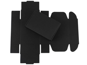 Flat lay of matte black foldable kraft paper jewelry box showing both assembled and flat state
