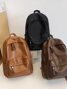 Minimalist large PU leather backpack for students in black, tan, and dark brown colors