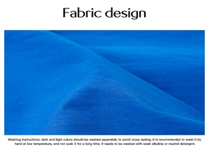 Detailed fabric texture of blue summer dress showing material and washing instructions