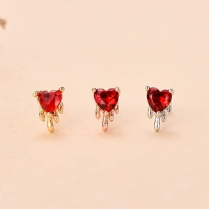 Vintage heart zircon stud earrings in gold, silver, and rose gold with dripping metal design