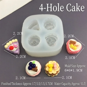 Macro detail of 4-cavity silicone mold showing cake and heart resin finished samples