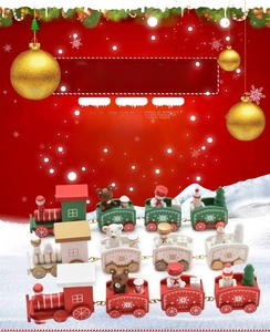 Close-up of wooden Christmas train set featuring Santa and snowman in festive red and green
