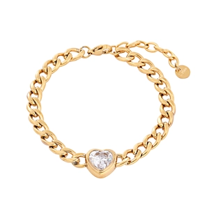 Detail of 18K gold plated Cuban chain bracelet featuring a clear heart-shaped zircon crystal