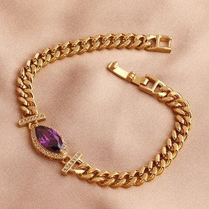 Detailed view of a gold-plated bracelet with marquise purple zircon and micro-pave crystals