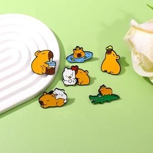 Set of 6 cute cartoon capybara enamel pins featuring capybaras with crocodile and duck