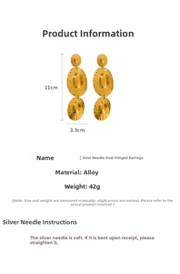 Detailed view of hammered metal oval earrings showing 11cm length and 3.3cm width