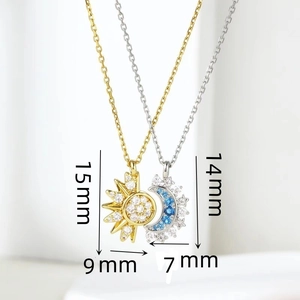 Detail view of 15mm sun and 14mm moon necklaces with blue gemstones and crystals