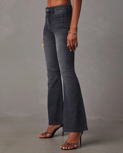 Detail view of charcoal high waisted flare jeans featuring front patch pockets and slim fit