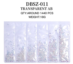 Detailed view of Transparent AB glass crystals in 6-grid bag for professional nail art