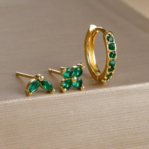 S925 sterling silver earring set with green crystals and leaf motifs in gold finish