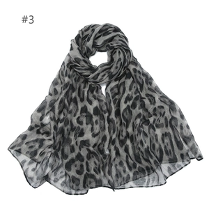 Classic leopard print chiffon head scarf for women in black and grey tones on white background