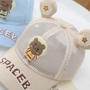 Detail of baby mesh baseball cap featuring cute bear ears and astronaut patch