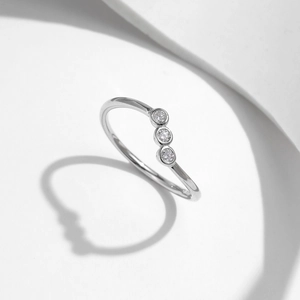 Irregular S925 sterling silver ring featuring three vertical sparkling moissanite stones