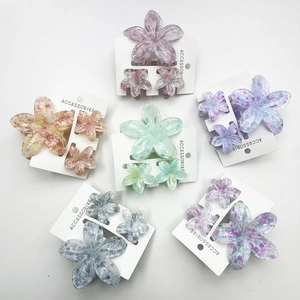 Frangipani hair claw clip set with gradient colors and glitter finish for summer styling