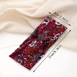 Flat lay of floral twist headband showing measurements 9cm width and 21cm length