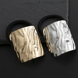 Minimalist metallic hair ties with hammer texture finish in gold and silver colors