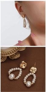 Detailed view of gold pearl hoop earrings and model showcase for size comparison
