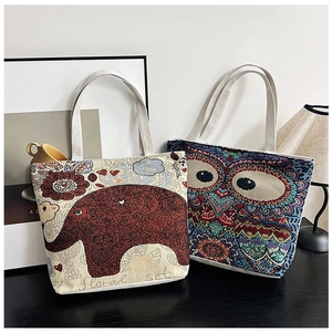 Ethnic canvas tote bags featuring bohemian elephant and owl embroidery patterns
