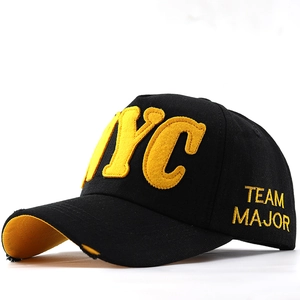 Vintage black cotton baseball cap with yellow NYC embroidery and distressed brim edge