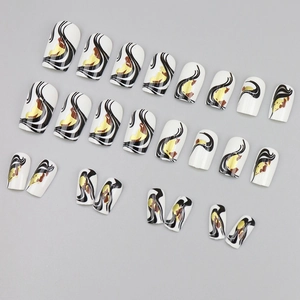 Reusable white press-on nails set with elegant black fluid lines and gold foil accents