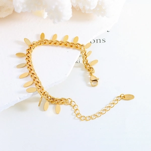 18K gold chunky chain bracelet featuring smooth oval tags and a secure lobster clasp