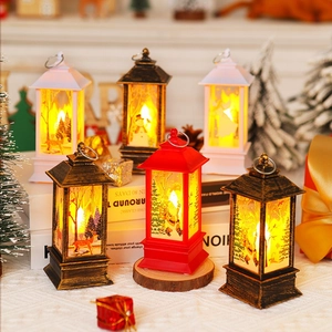 Christmas lanterns with Santa and snowman patterns for warm holiday tabletop decoration