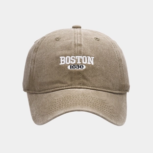 Close-up of the vintage washed khaki baseball cap with Boston 1630 white embroidery