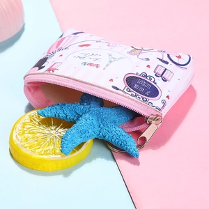 Pink PU coin purse with Eiffel Tower print, zipper closure and metal keychain ring