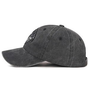 Vintage washed dark grey baseball cap with embroidered patch and curved brim