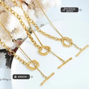 Detailed macro view of an 80cm medical grade titanium steel golden sweater chain