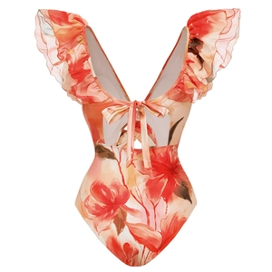 Detail of ruffled shoulders and cutout bow on floral one-piece swimsuit for women