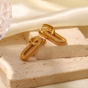 Exaggerated 18K gold plated stainless steel chain hoop earrings on stone background