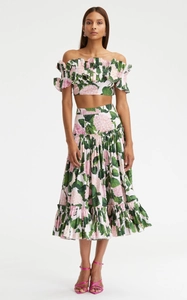 Detail of off-shoulder ruffled top and high-waist skirt with pink hydrangea floral print