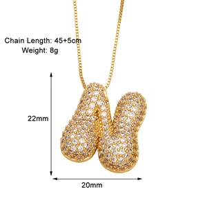 Detailed size chart for gold-plated letter N necklace with cubic zirconia paving