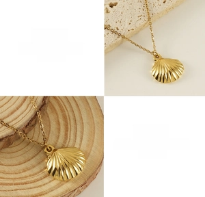 Detail view of gold fan-shaped shell pendant necklace made of waterproof titanium steel