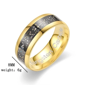 Detail showing 8mm golden tungsten carbide ring with starry black inlay and 6g weight