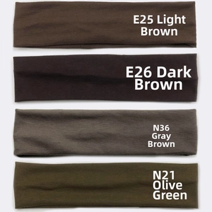 Flat lay of four elastic cotton sports headbands in brown, grey, and olive green colors