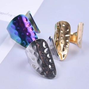 Polished stainless steel open rings with hammered texture in silver, gold, and rainbow colors