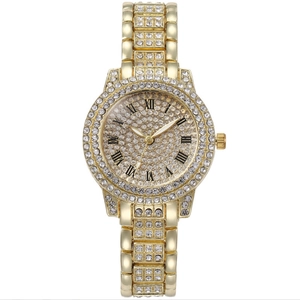 Luxurious gold-tone women's quartz watch fully iced out with sparkling crystals and Roman dial