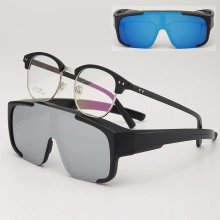 Close-up of polarized cycling sunglasses with silver reflective lens and optical frame insert