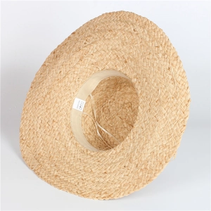 Detailed interior of 100% paper straw hat showing weave texture and inner sweatband