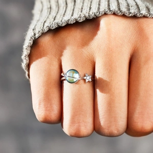 Minimalist S925 sterling silver ring with blue planet bead and sparkling star charm