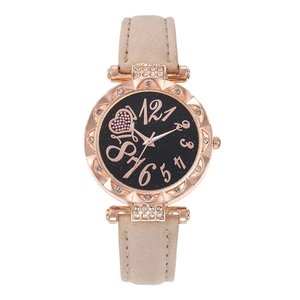 Women's rose gold watch with rhinestone bezel, black heart dial and beige leather strap