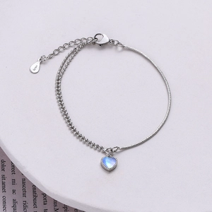 Close-up of S925 heart moonstone bracelet featuring double-layer snake and bead chain