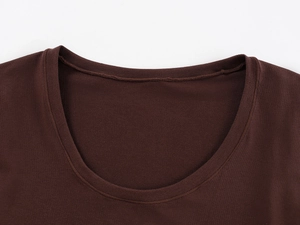 Detailed view of brown U-neck stitching and soft knit fabric texture on slim fitness tee