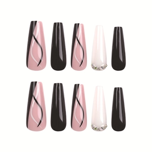 Faux ongles longs forme cercueil noir et blanc avec lignes ondulées et strass brillants
