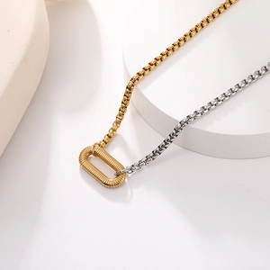 Two-tone stainless steel box chain necklace with textured gold oval pendant