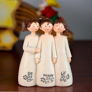 Three sisters resin figurine sculpture featuring Big Sis, Middle Sis, and Lil' Sis robes
