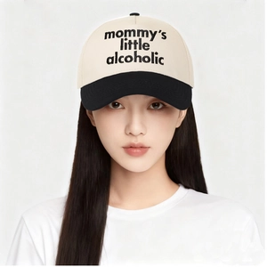 Detail of embroidered Mommy's Little Alcoholic text on two-tone cotton baseball cap